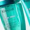 Close-up of two Kerastase hair care products: a blue shampoo bottle labeled "Bain Exextensioniste" and a conditioner tube labeled "Fondant Extentioniste," both from the Resistance line.