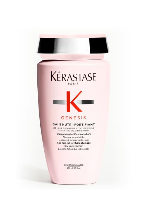 Flacon rose opaque de shampooing Kerastase Genesis Bain Nutri-Fortifiant pour cheveux secs et affaiblis.