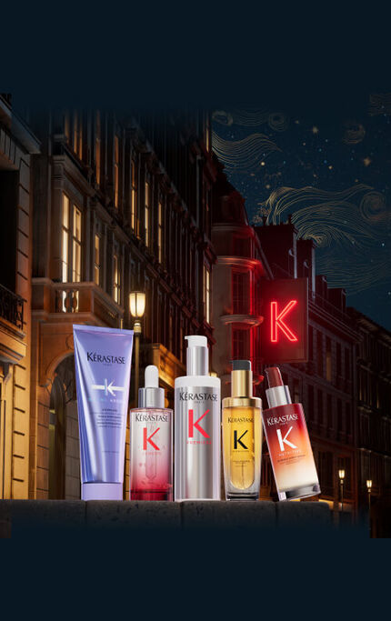 Alt text: "Gamme de produits de soin capillaire affichee sur un mur dans un cadre urbain nocturne."