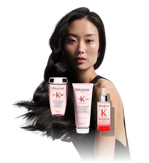 Femme presentant les produits Kerastase Genesis (shampooing, apres-shampooing, serum) superposes, illustrant la routine.