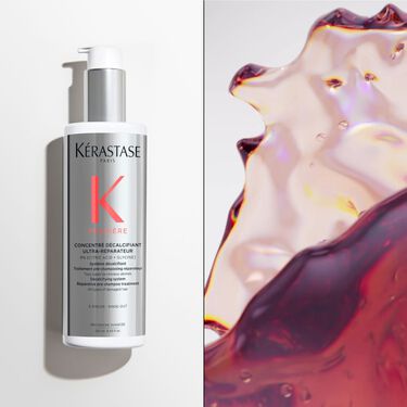 Le concentre decalcifiant ultra-reparateur premiere Kerastase est pose sur un socle.