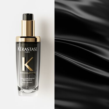 L'huile Chronologiste Kerastase est pose a plat sur un support blanc.