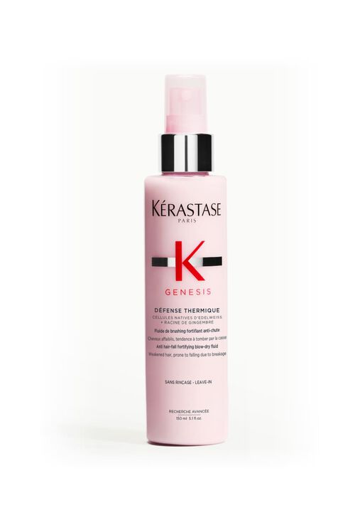 Flacon rose de Kerastase Genesis Defense Thermique, un soin protecteur thermique pour cheveux.