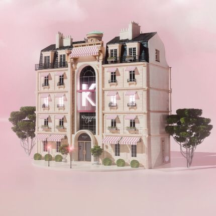 Illustration 3D d'un immeuble de style parisien classique arborant un grand "K" et l'enseigne "Kerastase Club" sur un fond rose brumeux.
