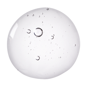 Goutte d'eau transparente avec des bulles d'air, representant la legerete et la purete.