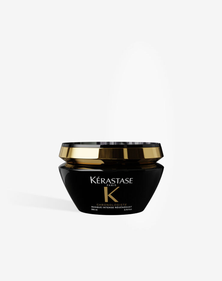 Le masque capillaire Kerastase Chronologiste Masque Intense Regenerant dans son pot noir haut de gamme au couvercle dore.