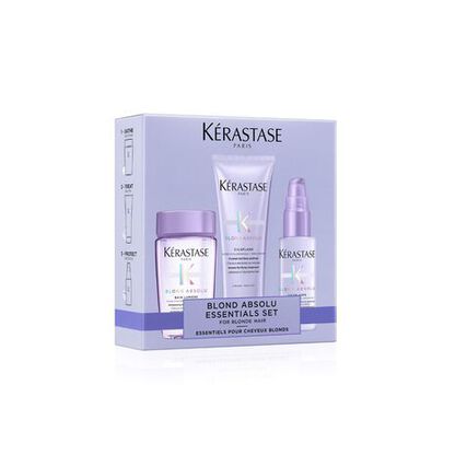 Ensemble de soins pour cheveux blonds Kerastase, comprenant un shampooing, un masque et un serum, en packaging elegant.