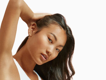 What causes Dandruff?