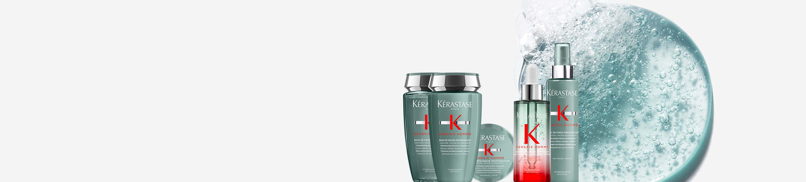 Gamme de soins capillaires Kérastase avec produits en flacon, entourés d'eau éclaboussante.