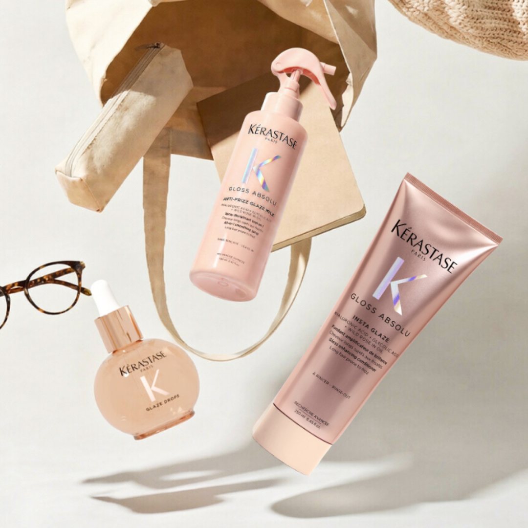 Les produits de la gamme Gloss Absolu sortent d'un sac en paille et sont suspendus dans l'air.
